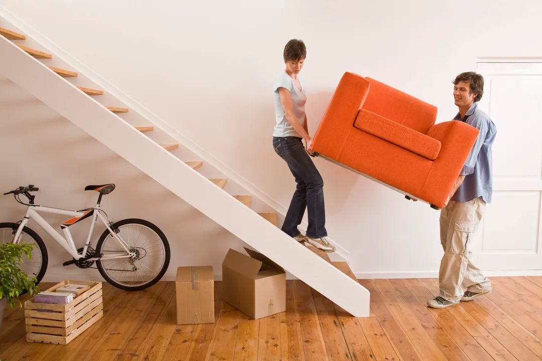 new movers moving furniture