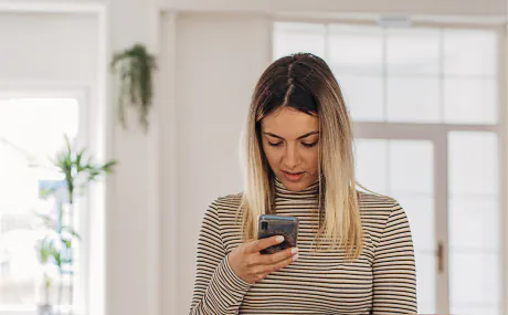 female consumer checking phone