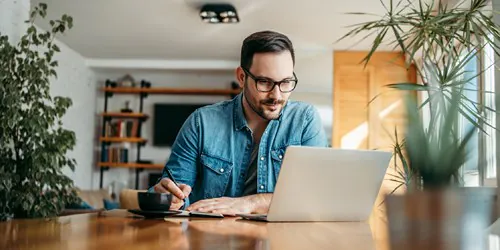 man working on descriptive analytics for niche market business